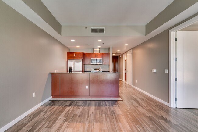 Building Photo - Iconic Strip-View Luxury | Elegant 1BR + Den High-Rise Residence