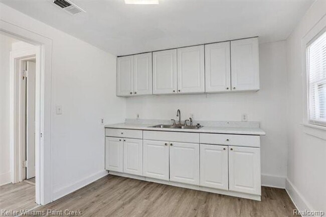 Building Photo - 7559 Studebaker Ave