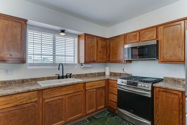 Building Photo - COMING SOON! Spacious 4-Bed Home Near South Mountain with Views and Upgrades