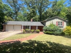 Building Photo - Spacious Multi-Level Brick Home