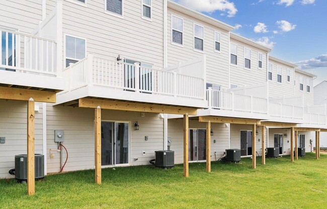 back, exit to backyard and covered by deck above - 5977 Cling Ln