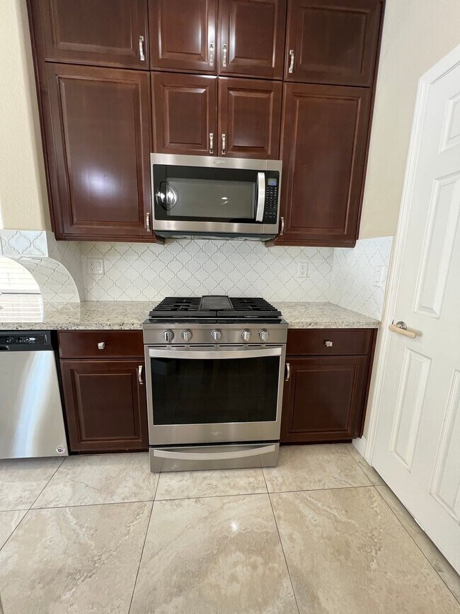 Building Photo - A Fantastic 4 Bedroom Home with the primary Downstairs, in Silverado Ranch