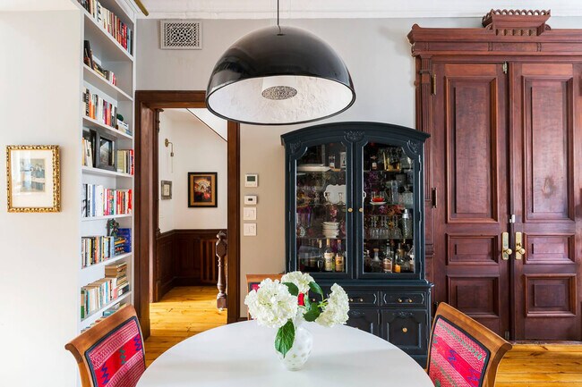 Dining area, featuring built-in bookshelves - 140 Halsey St