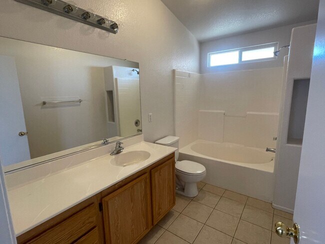 Building Photo - Adelanto Home-3 Bedrooms,2 Bathrooms, Laminate Floors, Indoor Laundry Room, Large Back Yard