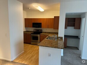 Building Photo - 2 Bed 2 Bath Spacious Condo in the Heart o...