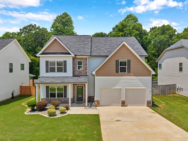 Building Photo - Spacious 4BR Home with Fenced Yard & Community Pool
