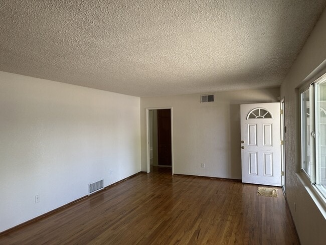 Building Photo - ome and view this beautifully updated 2-be...