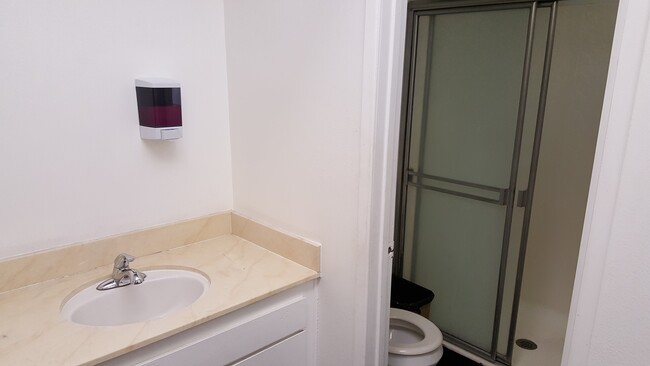 2 restrooms and shower in laundry and jacuzzi area - 5870 Green Valley Cir