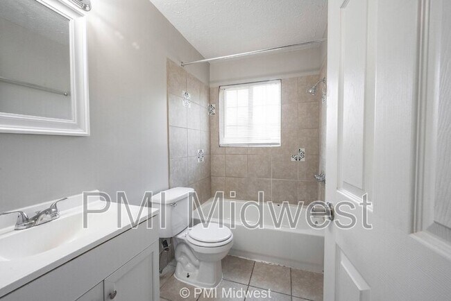 Building Photo - 6260 E 11th St