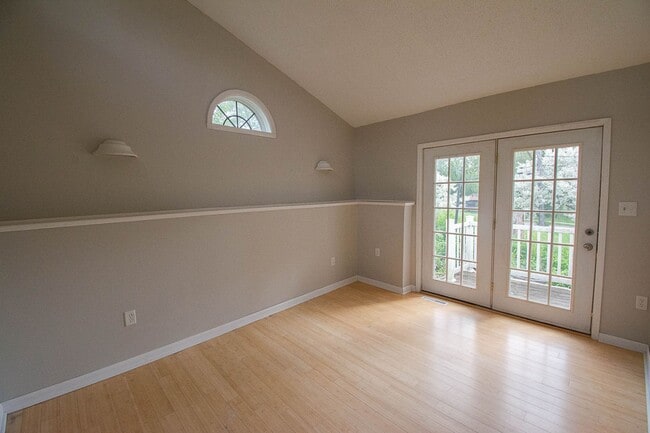 Building Photo - Bright, freshly painted home with HUGE garage space!