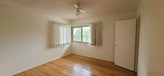 Building Photo - Classic, Midcentury 3 bedroom with Den, 2.5 bath home nestled into hillside with secluded backyar...