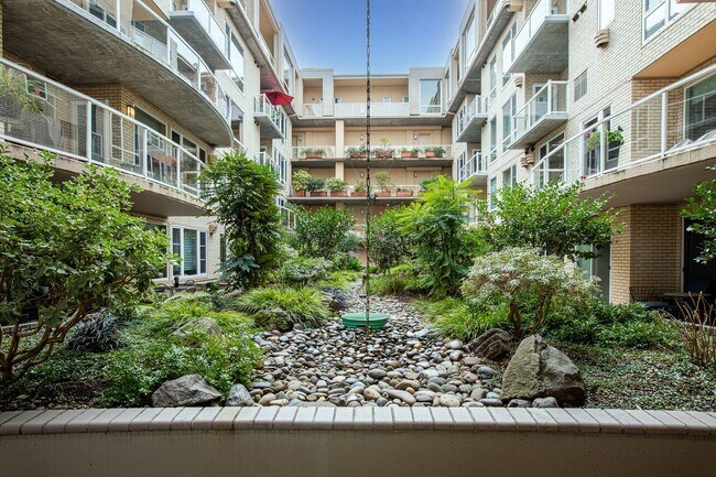 Building Photo - Sweet + secure 1/1 condo with parking, extra storage room + AC available now!