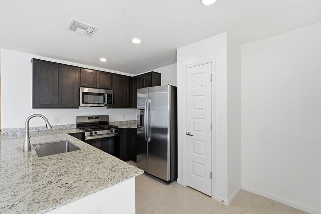 Building Photo - Modern Comfort Meets Desert Serenity – 4 Bed Rocking K Rental Home Available Now!