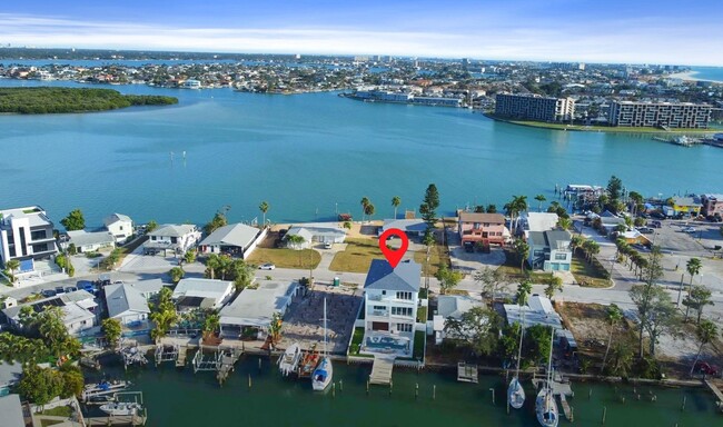 Building Photo - Waterfront Johns Pass Luxury | Steps to Beach + Pool, Hot Tub & Dock