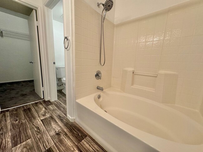 Building Photo - ADORABLE 2 BEDROOM 2 BATHROOM CONDO WITH A...