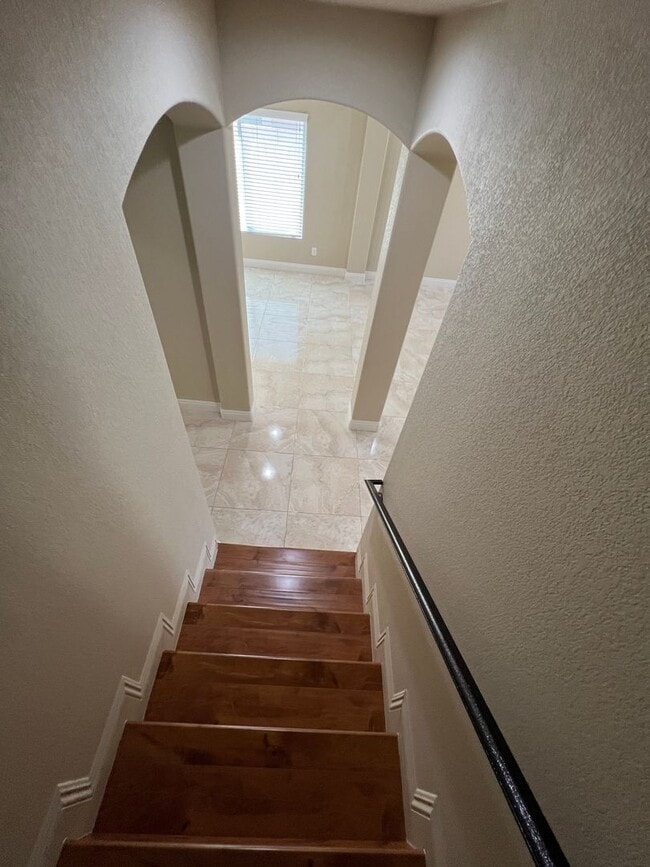 Building Photo - A Fantastic 4 Bedroom Home with the primary Downstairs, in Silverado Ranch