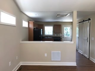 Family room opens to kitchen - 2312-A Belle Ave NE