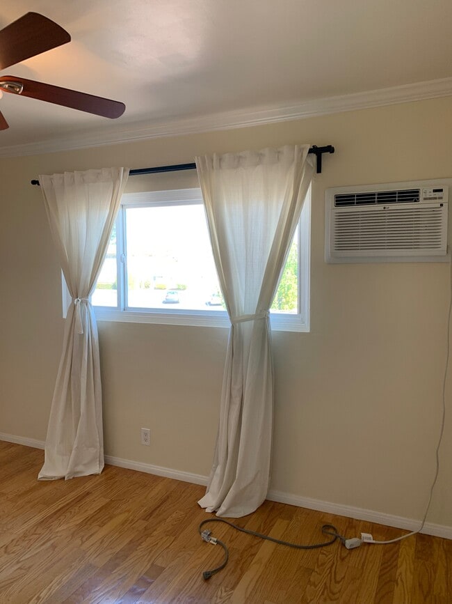 Bedroom #1 with drapes and A/C - 204 W Fairview Ave