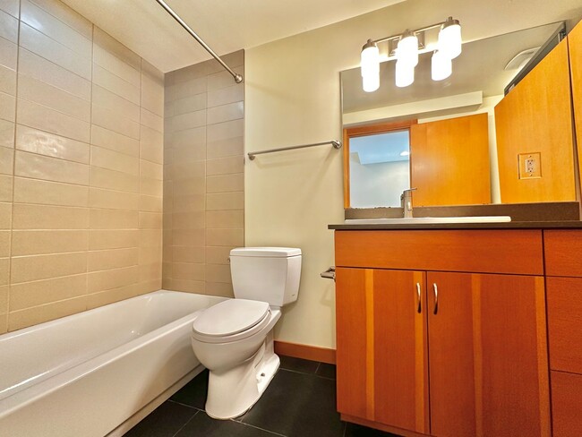 Building Photo - Three-Level Loft-Style 2BR | 3BA with Priv...
