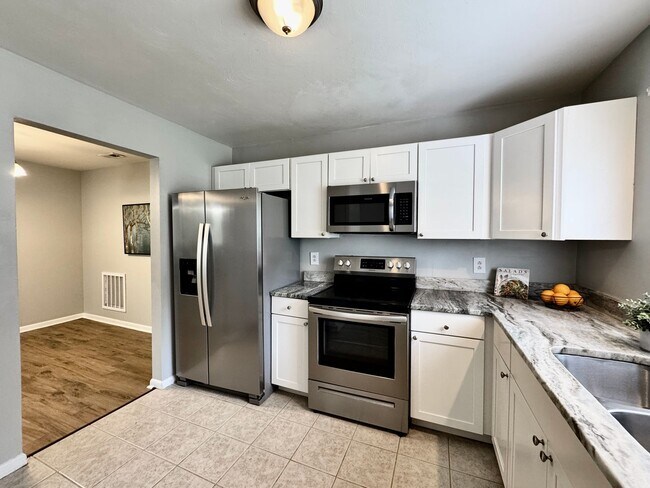 Building Photo - Completely Updated & Ready NOW!! 1-Car Attached Garage! Pet Friendly!