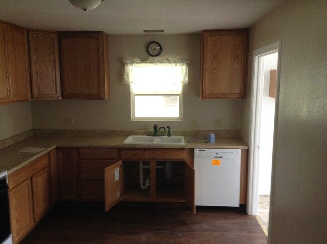 Includes dishwasher and garbage disposal. - 24 N K St