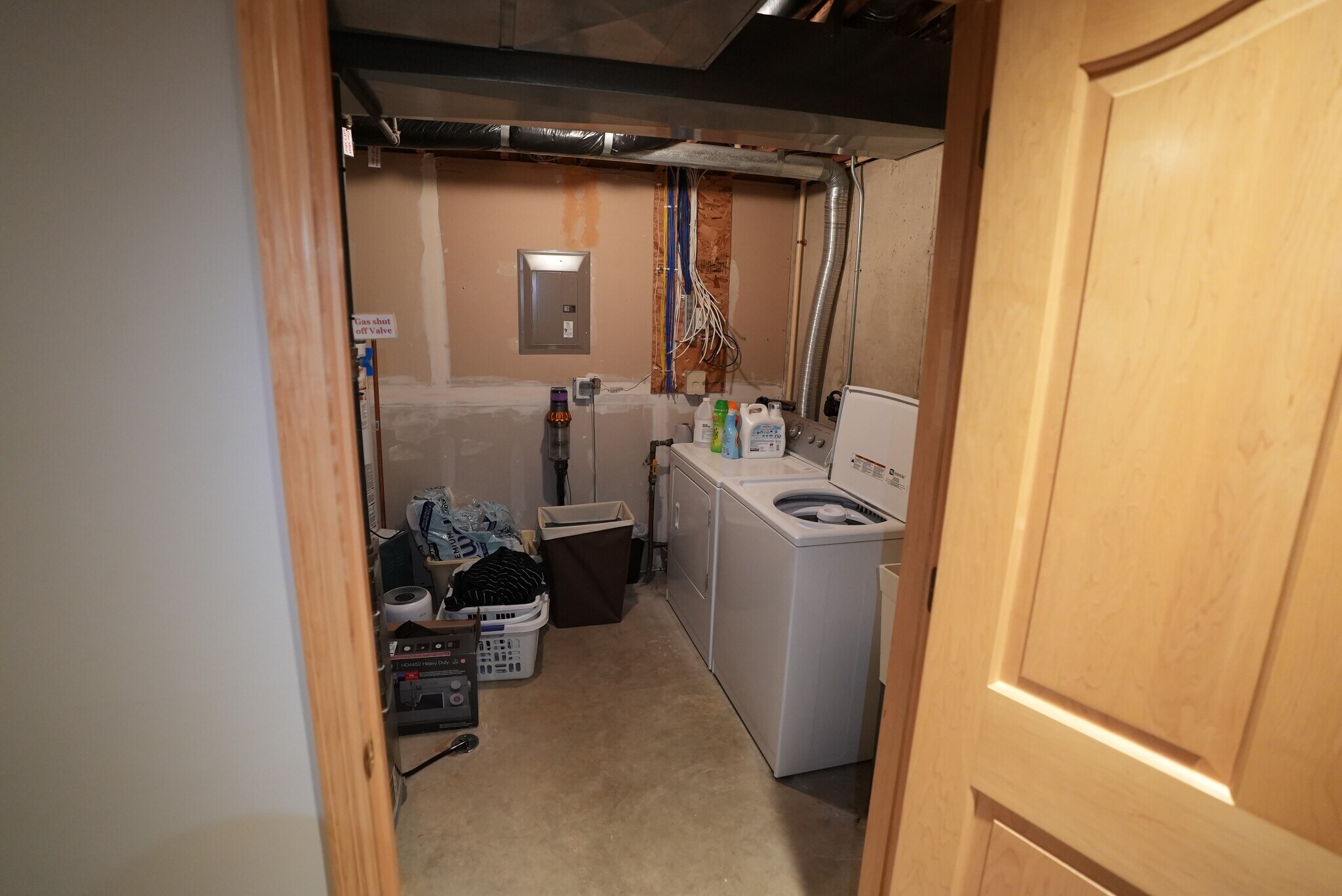 Laundry room with unit washer and dryer - 54 Wood Brook Way