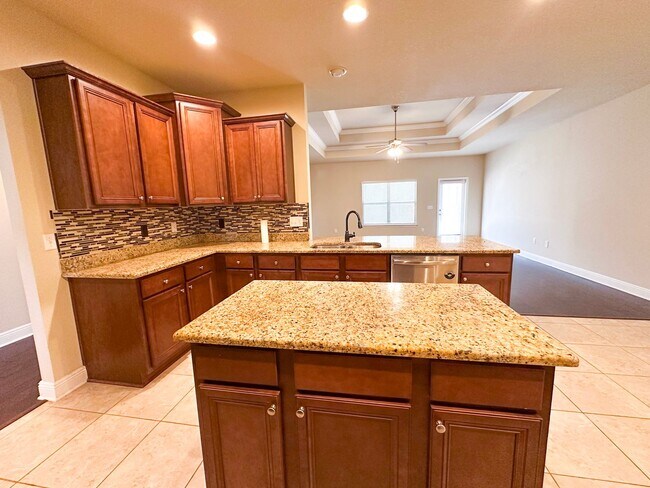 Building Photo - Well maintained 4 bedroom home with 2 car garage