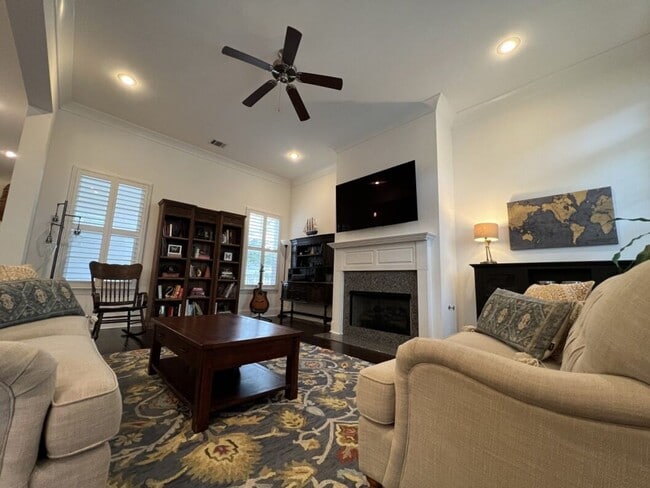 Building Photo - Luxury 4BR Home in Americana | 11 Ft Ceilings, Courtyard Living & Furnished Option at $3,950
