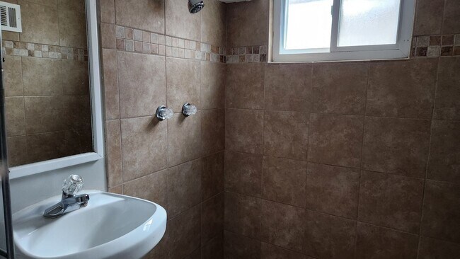 Building Photo - Four Bedroom House Available NICE
