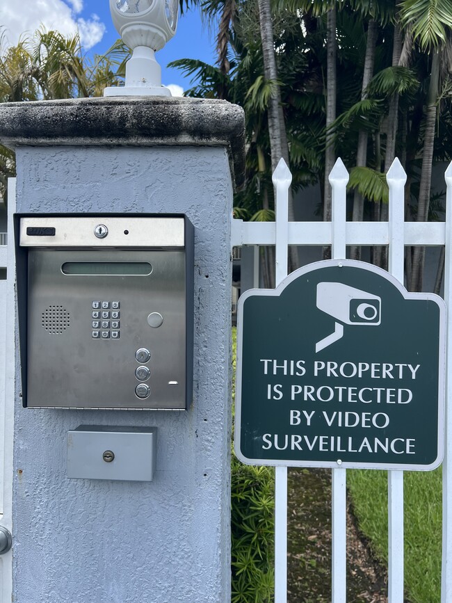 Gated security with surveillance - 4600 SW 67th Ave