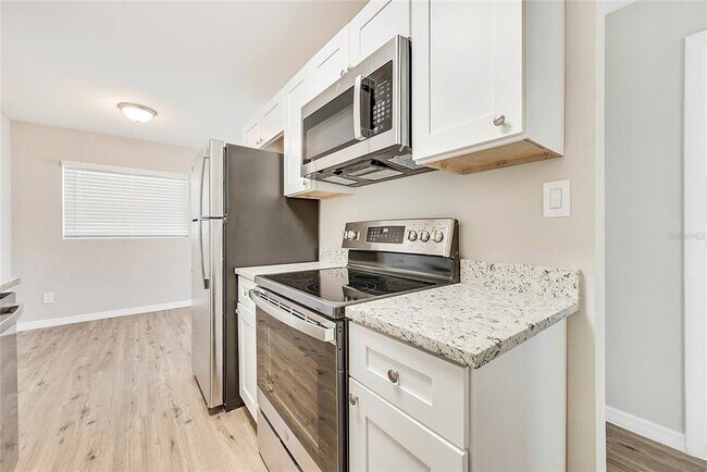 Building Photo - 5027 Kempston Dr