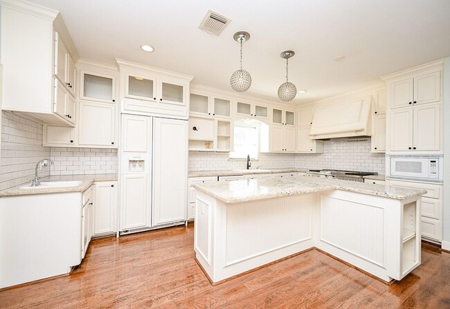 Building Photo - Discover this stunning one-story corner lo...