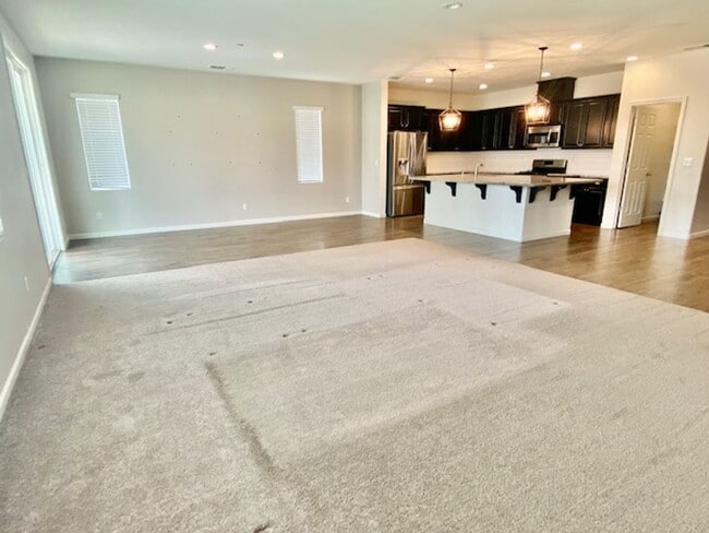 Building Photo - ALMOST NEW, UNIQUE 4 BEDROOM, 3 BATH, 2 CA...