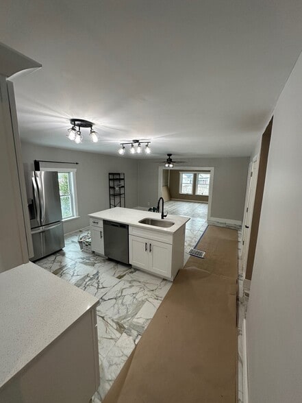 Open concept kitchen with island. - 8215 Lake Pleasant Rd