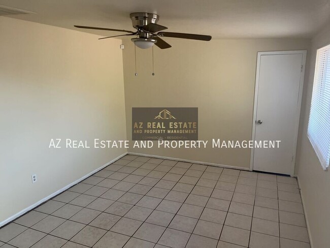 Building Photo - 3841 N 63rd Dr