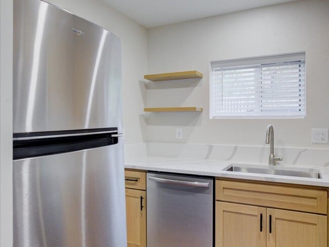 Building Photo - Cozy 2-Bedroom Home with Community Pool & Covered Parking