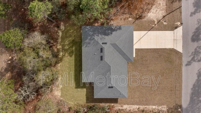 Building Photo - 9461 N Sandree Dr