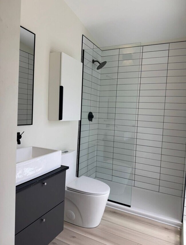 Building Photo - Vaulted Ceilings & Hardwood Floors in This Charming Indianapolis L