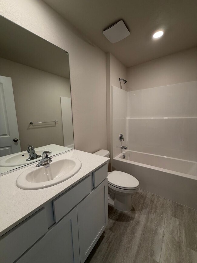 Building Photo - Beautiful & Brand New- 4 bed, 2 bath w/Quartz Countertops & Fenced Yard
