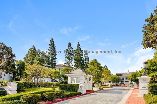 Building Photo - Updated Newport Beach Condo in Gated Versailles Community with Resort-Style Amenities