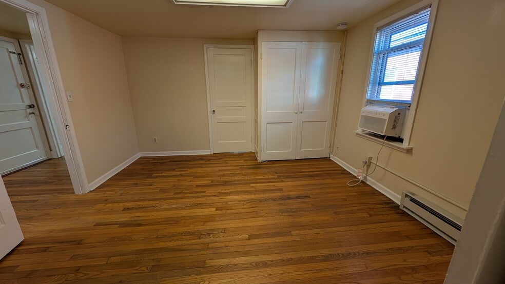 Bedroom with direct access to livingroom. - 20 W Main St
