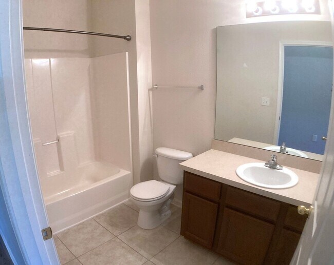 Building Photo - Spacious 3-Bedroom Condo with Pond Views &...