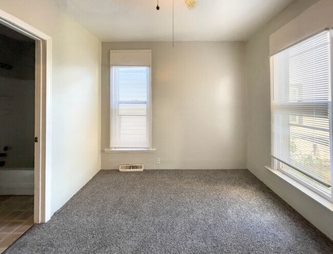 Building Photo - Downtown Home with fence and nice updates ...