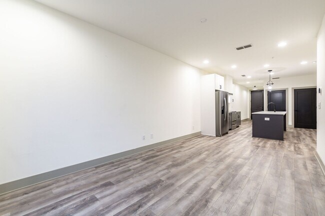 Building Photo - Modern Living Meets Walkable City Charm in...
