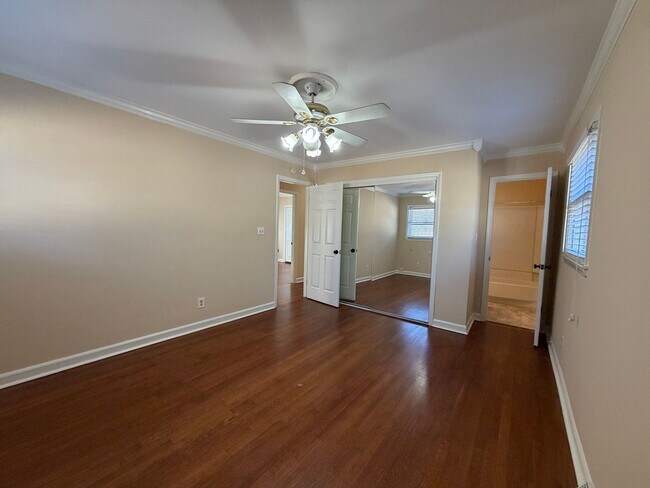 Building Photo - Freshly Painted Split-Level Home with Large Deck & Lawn Care Included