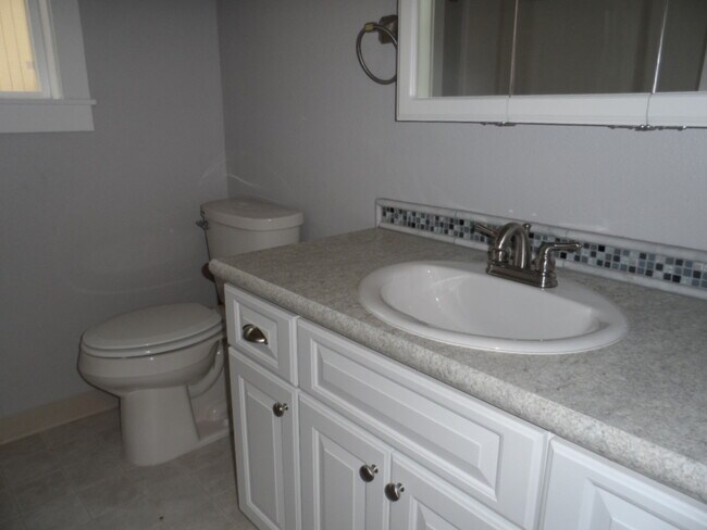 Building Photo - Inviting 3-Bedroom Home with Workshop/Storage and Outdoor Space