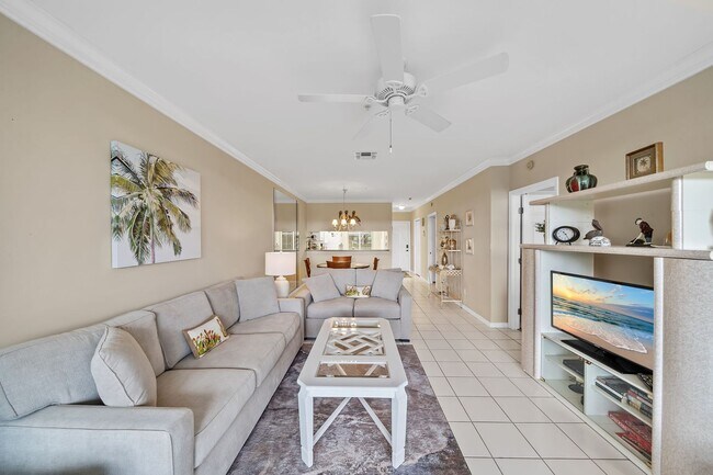 Building Photo - first-floor unit featuring a 2 bedroom, 2 bath fully furnished