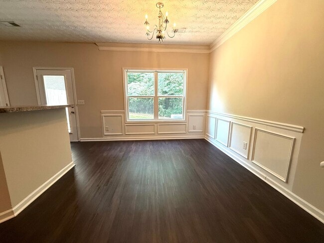Building Photo - Welcome to this charming 3 bedroom, 2.5 ba...