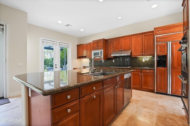 Building Photo - 6077 Mandeville Pl