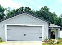 Building Photo - Brand New 3/2/2 furnished close to I75 to commute to Tampa or Ocala.